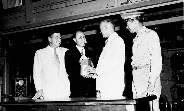 Eugene Wigner hands over a medical isotope.