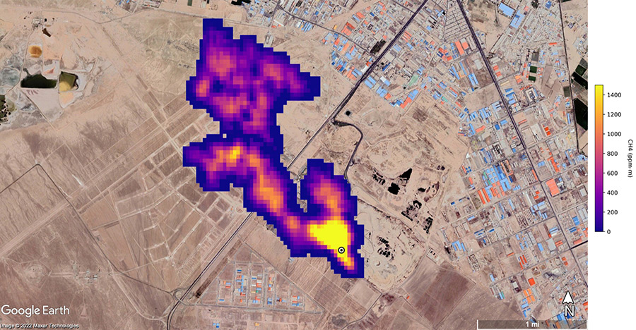 A satellite view of an area in Iran superimposed with methane emission data.