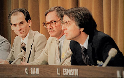 Ed Stone, Voyager Project Scientist, Brad Smith, and Carl Sagan at a Voyager press briefing. Photo Credit: JPL