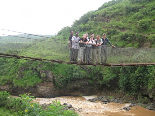 The University of Maryland EWB team on a suspension bridge over the Berga River in the conservation area near Addis Alem. CREDIT: Catherine O'Riordan