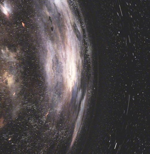 Fig. 12. A close-up of Interstellar's wormhole. The long, streaked stars alongside the Einstein ring are a result of motion blur: the virtual camera's shutter is open for a fraction of a second (in this case, approximately 0.02 s) during which the stars' lensed images appear to orbit the wormhole, causing the curved paths seen here. [From Interstellar, but cropped. Created by our Double Negative team. TM &amp; Copyright Warner Bros. Entertainment Inc. (s15). This image may be used under the terms of the Creative Commons Attribution-NonCommercial-NoDerivs 3.0 (CC BY-NC-ND 3.0) license. Any further distribution of these images must maintain attribution to the author(s) and the title of the work, journal citation and DOI. You may not use the images for commercial purposes and if you remix, transform or build upon the images, you may not distribute the modified images.] 