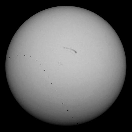 Fig. 1. Superposition of 15 images, each separated by 30 min, of the 2016 transit of Mercury, taken with a horizontally mounted camera from Hannover, Germany.