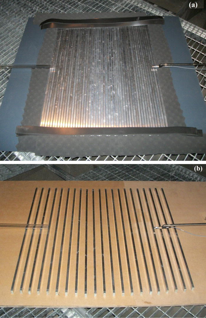 Surface waves over periodically-spaced rectangular strips | The Journal ...