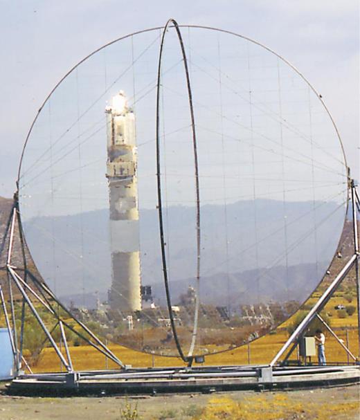  . La Plataforma Solar De Almería in southern Spain’s Tabernas desert is one of two major solar energy research centers in Europe. The reflection in the experimental stretched-membrane heliostat shows one of the center’s 84-meter receiving towers. 