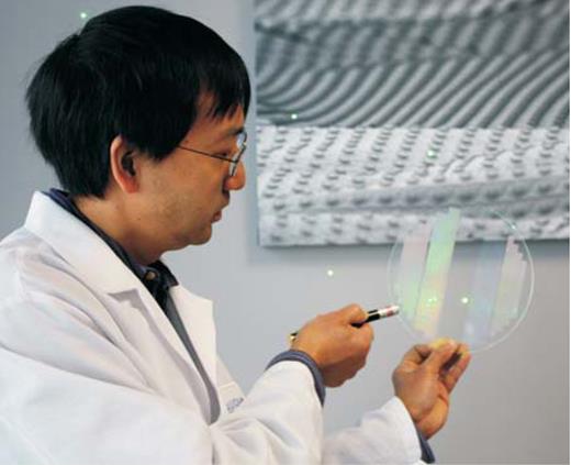  . Discrete nanopatterns that may improve the efficiency of solid-state lighting, photovoltaic devices, and drug delivery particles are illuminated by physicist Doug Mar at North Carolina-based startup Liquidia Technologies Inc, which continues to invest in R&amp;D despite the economic downturn. 
