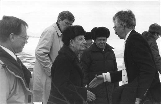 Figure 1. “I have been waiting 40 years for this.” With those words, Yuli Khariton(center), the 88-year-old scientific leader of the Russian Federal Nuclear Center–All-Russian Research Institute of Experimental Physics (RFNC-VNIIEF), greeted me along with my colleagues on the tarmac in the closed city of Sarov on 23 February 1992. At a banquet that night, Khariton explained how they got the bomb, including the role of Klaus Fuchs, who passed atomic secrets from Los Alamos to the Soviet government. Khariton spoke remarkably good English, with a British accent he acquired while a student of Ernest Rutherford’s at Cambridge University from 1926 to 1928.