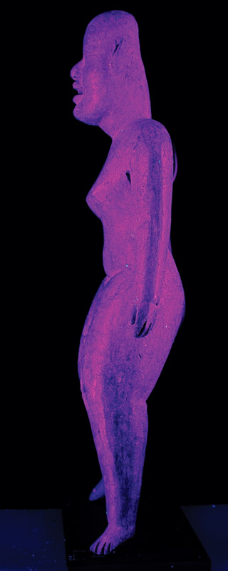 . The two related figurines shown here were found in Mesoamerican burial grounds and are currently housed at the University of Notre Dame’s Snite Museum of Art. (a)Exposing an artifact to UV light reveals the location of pigments invisible to the unassisted eye. (b) Proton-induced x-ray emission (PIXE) provides quantitative details of the pigment composition; in particular it reveals the iron and manganese content of the paint. Seen here is the copper-colored PIXE beam line from Notre Dame’s 11-MV electrostatic accelerator. Just visible at the left is the silicon–lithium detector used for observing the characteristic emitted x rays. Techniques such as UV and PIXE analysis are helping anthropologists trace two millennia of Mesoamerican cultural and religious history.