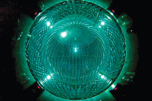 . Figure 1. At the Borexino detector, pictured here, solar neutrinos are detected in a 14-m-tall sphere filled with 278 tons of liquid scintillator. Incident neutrinos are heralded by bursts of light emitted as they scatter off the scintillator’s electrons. (Photo courtesy of the Borexino collaboration.)