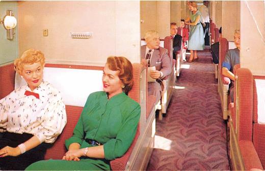 Figure 5. An advertisement for the Union Pacific Railroad circa 1950, depicting a Pullman sleeper car. The car in the image is configured for daytime seating. (Union Pacific Railroad, PD-US.)