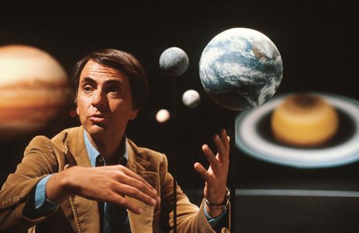 . Carl Sagan (1934–96), the prominent science popularizer, on the set of his 1980 TV show Cosmos. In his show and book of the same name, Sagan injects existential questions into his scientific discussion, similar to James Jeans. (Courtesy of Science History Images/Alamy Stock Photo.)