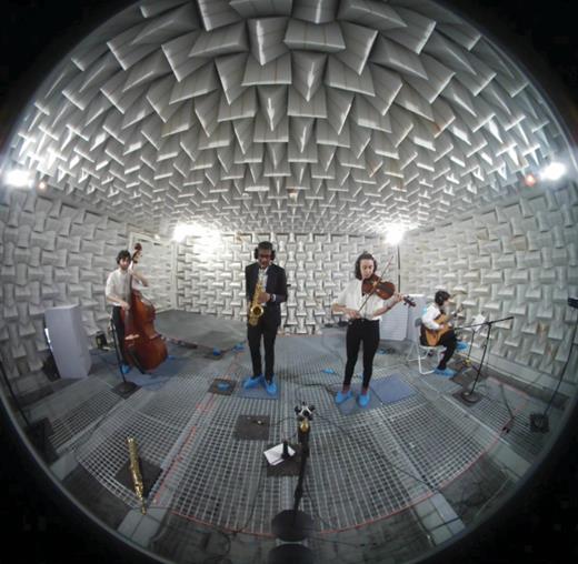 Figure 5. An anechoic chamber recording session of a quartet. (Adapted from www.lam.jussieu.fr/Projets/AVAD-VR; photo by David Thery.)