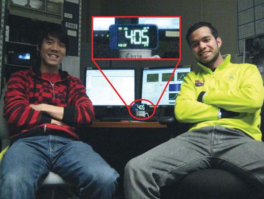 Figure 2. The control room at SLAC’s Next Linear Collider Test Accelerator facility was the setting for an overnight experimental run led by Stanford students Edgar Peralta (right) and Ken Soong. Their successful experiment was one of a pair that would change the trajectory of research in dielectric laser acceleration and set the stage for an international effort to develop miniaturized particle accelerators. (Image courtesy of Ken Soong.) 