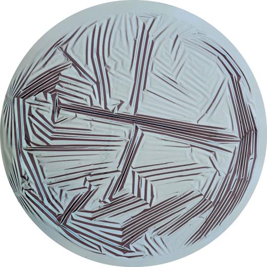 Figure 1. Random wrinkles formed on this thin sheet with a diameter of 42 mm. It was cut from a curved elastic sphere with a radius of curvature of 77 mm before being placed on a flat liquid surface. Other shapes form ordered wrinkle patterns. Both types of patterns can now be predicted with a simple pair of geometric rules. (Courtesy of Monica Ripp, Paulsen Lab, Syracuse University.) 