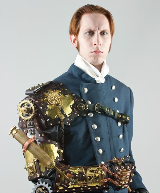  . G. D. Falksen, a science-fiction author, wearing a steampunk-style outfit that features an arm mechanism designed by the artist Thomas Willeford. 