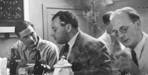  . The theorists Markus Fierz, Wolfgang Pauli, and Hans Jensen (from left to right) engaging in discussion over beers during a conference at Niels Bohr’s Institute for Theoretical Physics at the University of Copenhagen, sometime in the 1930s. 
