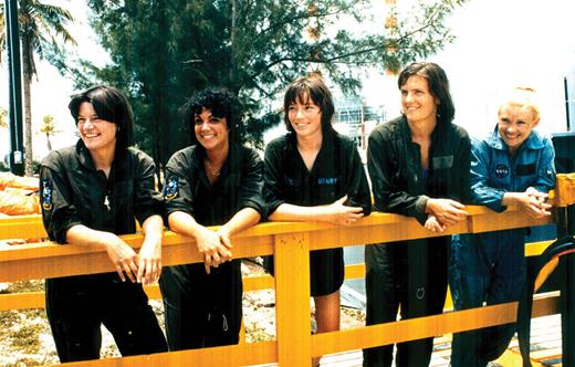 Ride stands with fellow women astronauts in her 1978 class during a break from training. From left are Ride, Judith Resnik, Anna Fisher, Kathryn Sullivan, and Rhea Seddon. (Photo from NASA.)