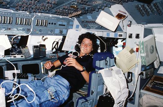 Ride communicates with ground control aboard space shuttle Challenger during her first trip to space, in 1983. (Photo from NASA.)