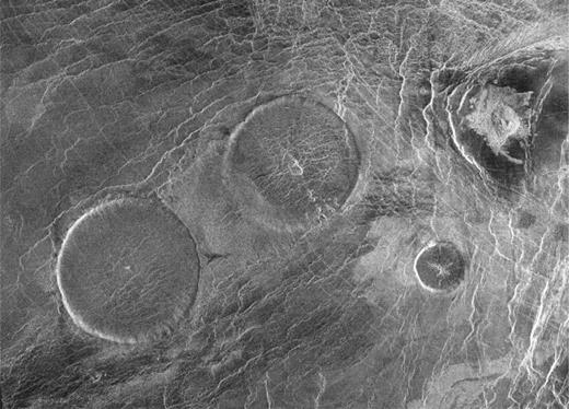 High-resolution Magellan SAR image of a group of three “pancakelike” domes in Carmenta Farra Planitia on Venus (NASA, public domain).