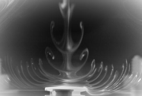 Example of dust ejected by an atmospheric pressure Ar/HMDSO flow-through plasma and interacting with a witness sample for contamination control research (courtesy of T. J. A. Staps and T. J. M. Donders, CIMlabs, Eindhoven University of Technology, The Netherlands).