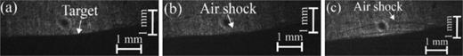 FIG. 8. Shadow images of shocks generated in water above the aluminum target. (a) t = 5.1, (b) t = 5.3, and (c) t = 5.5 μs. The frame duration is 10 ns. t = 0 is defined at the beginning of the discharge current.