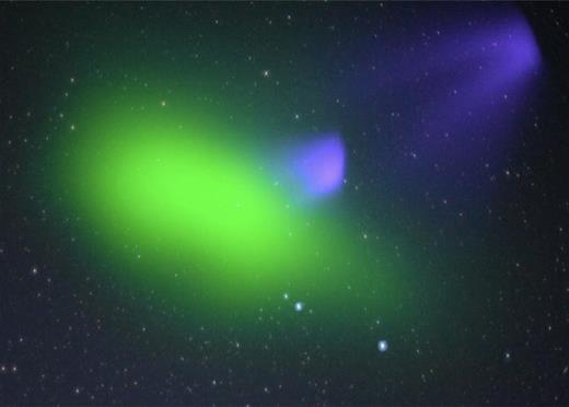 The two barium ion clouds (violet) and the green neutral barium cloud from the second release as viewed from the aircraft.